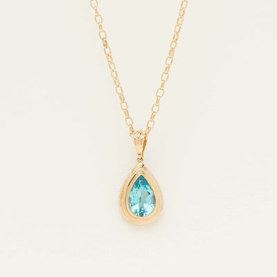Deja Vu 9ct Yellow Gold Pear Blue Topaz Pendant