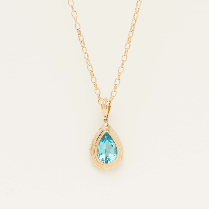Deja Vu 9ct Yellow Gold Pear Blue Topaz Pendant