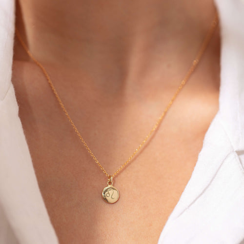 Model wearing engraved 9ct Yellow GOld Pebble Pendant