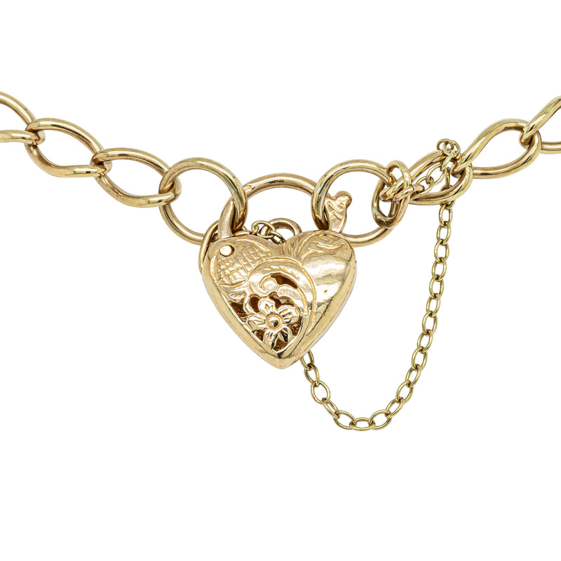 Deja Vu 9ct Yellow Gold Curb Bracelet With Floral Heart Padlock - Bracelet - Walker & Hall