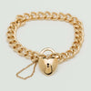 Deja Vu 9ct Gold Solid Curb Bracelet with Puff Heart Padlock