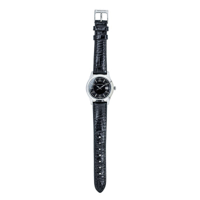 Watch with black strap and silver case on a white background