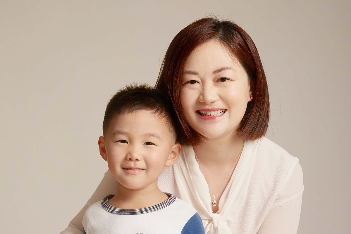 Sandre, Walker & Hall team member and her son